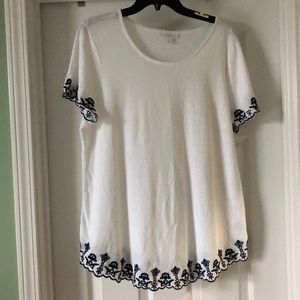 White short sleeve top with navy embroidery
